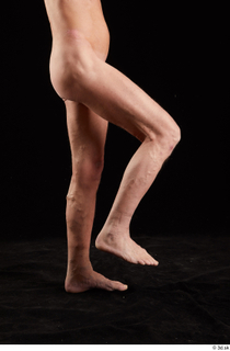 Joseph  1 flexing leg nude side view sitting 0003.jpg